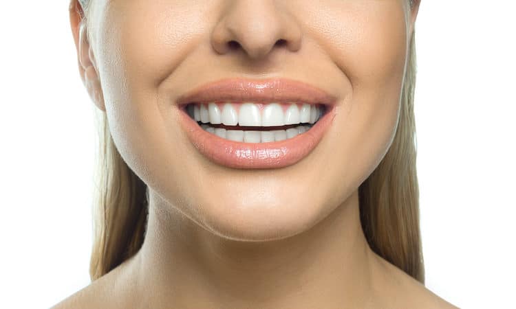 How can a cosmetic dentist improve my smile?