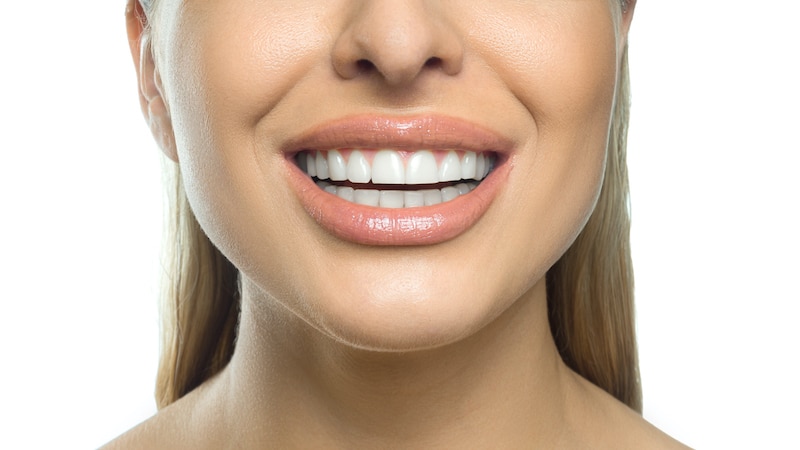 How can a cosmetic dentist improve my smile?