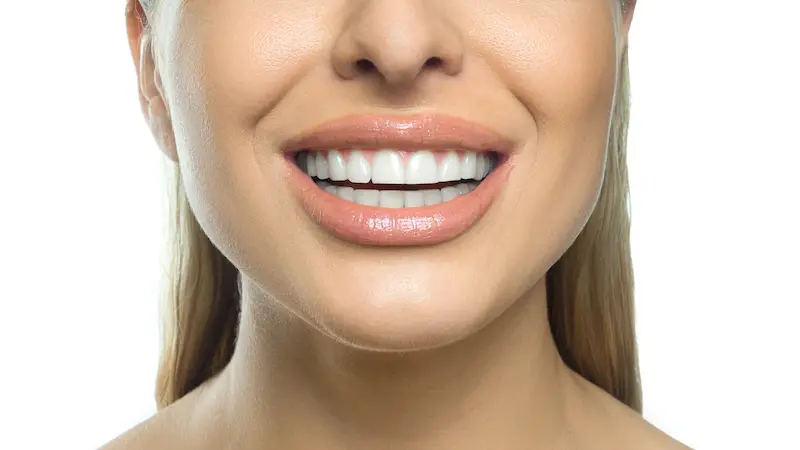 How can a cosmetic dentist improve my smile?